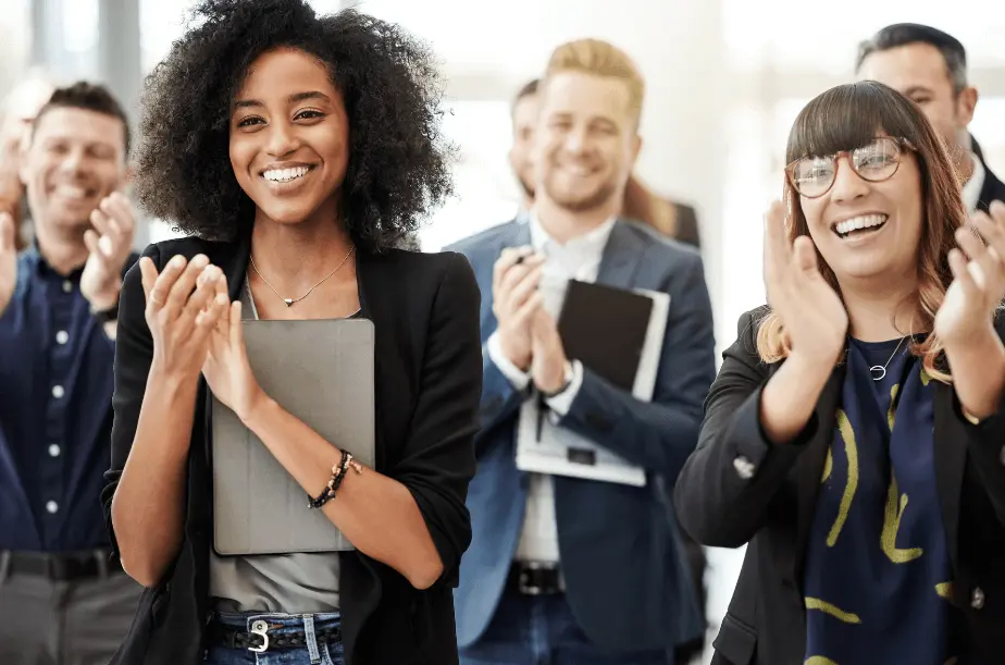 Group of employees clapping